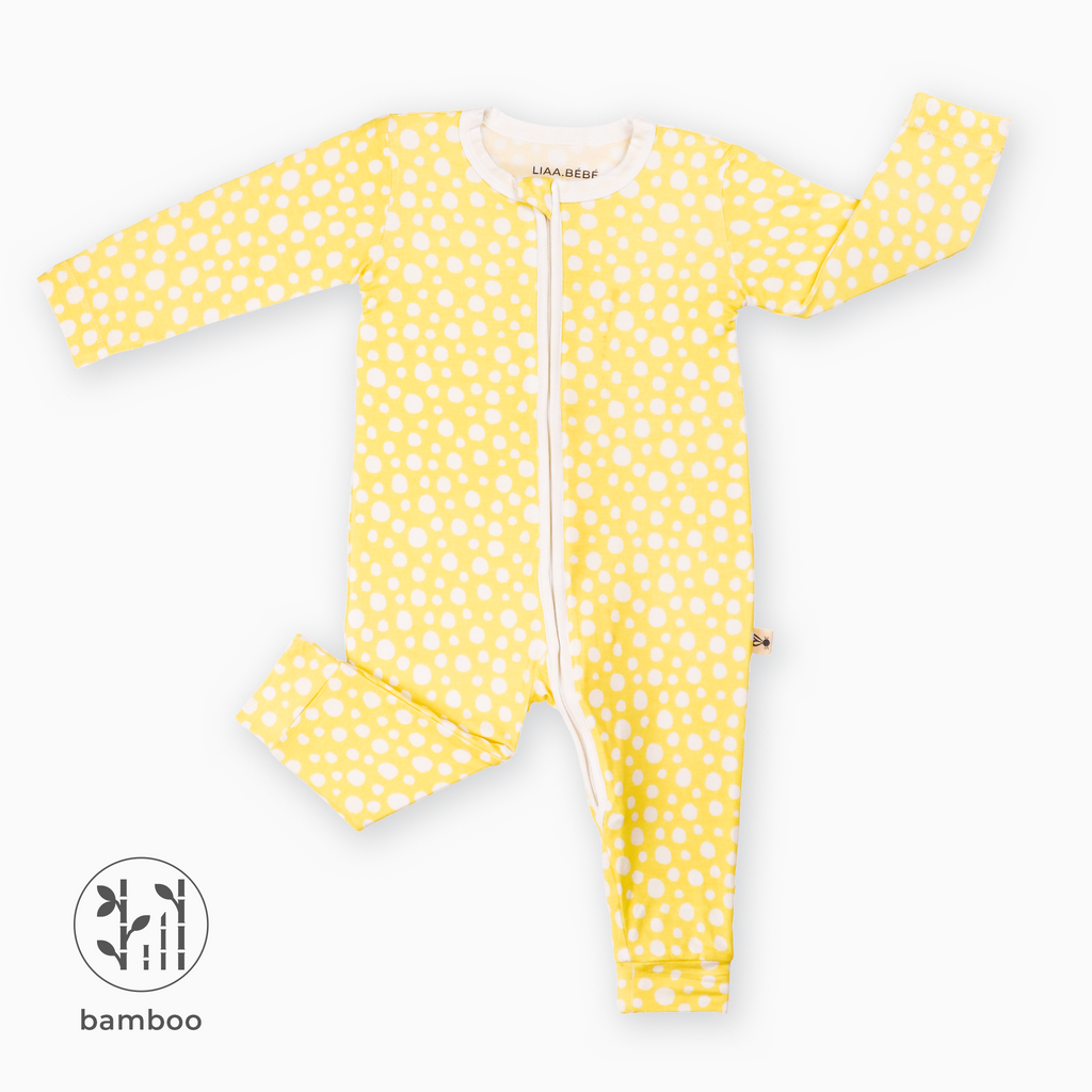 Light Yellow LiaaBébé toddler Sleepsuit with dots and without feet.