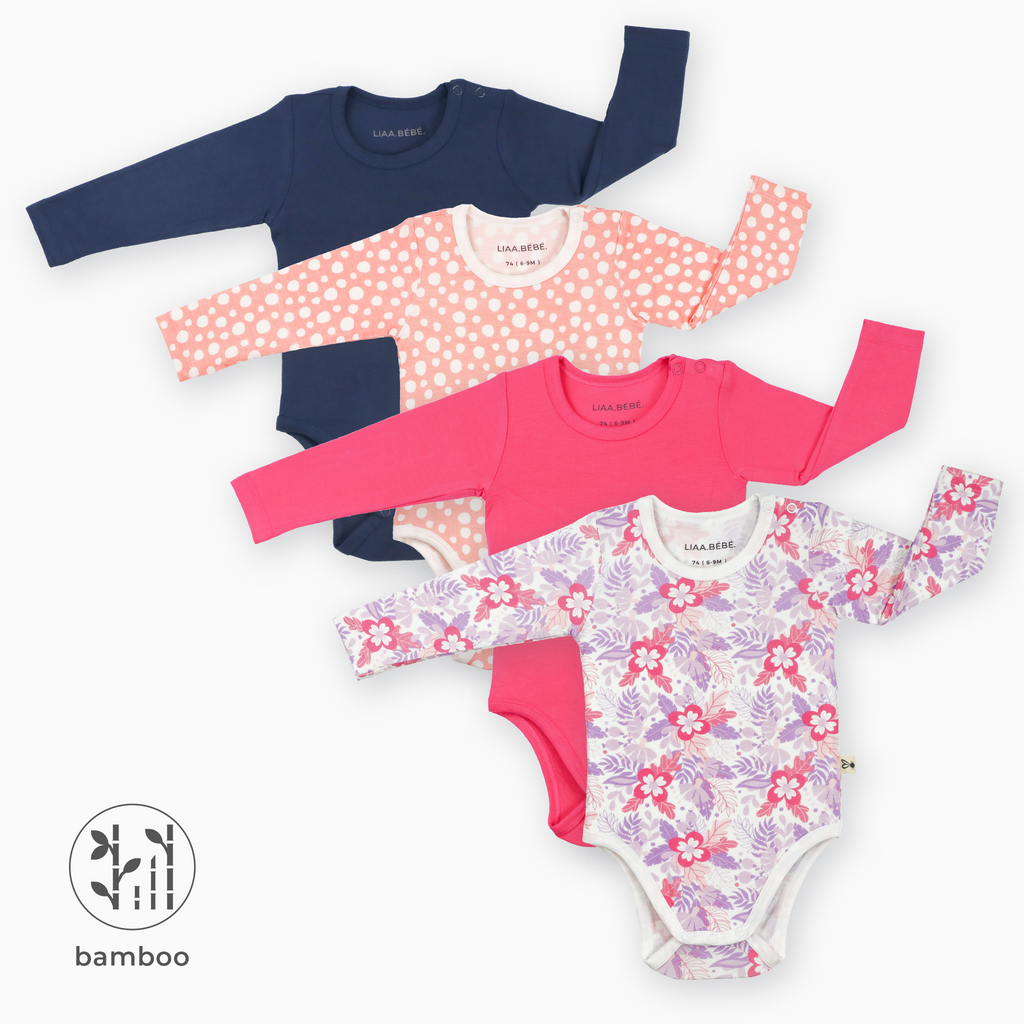 Pack of 4 LiaaBébé Long Sleeve Bodysuits in navy blue, hot pink, purple flower and light pink with dots.