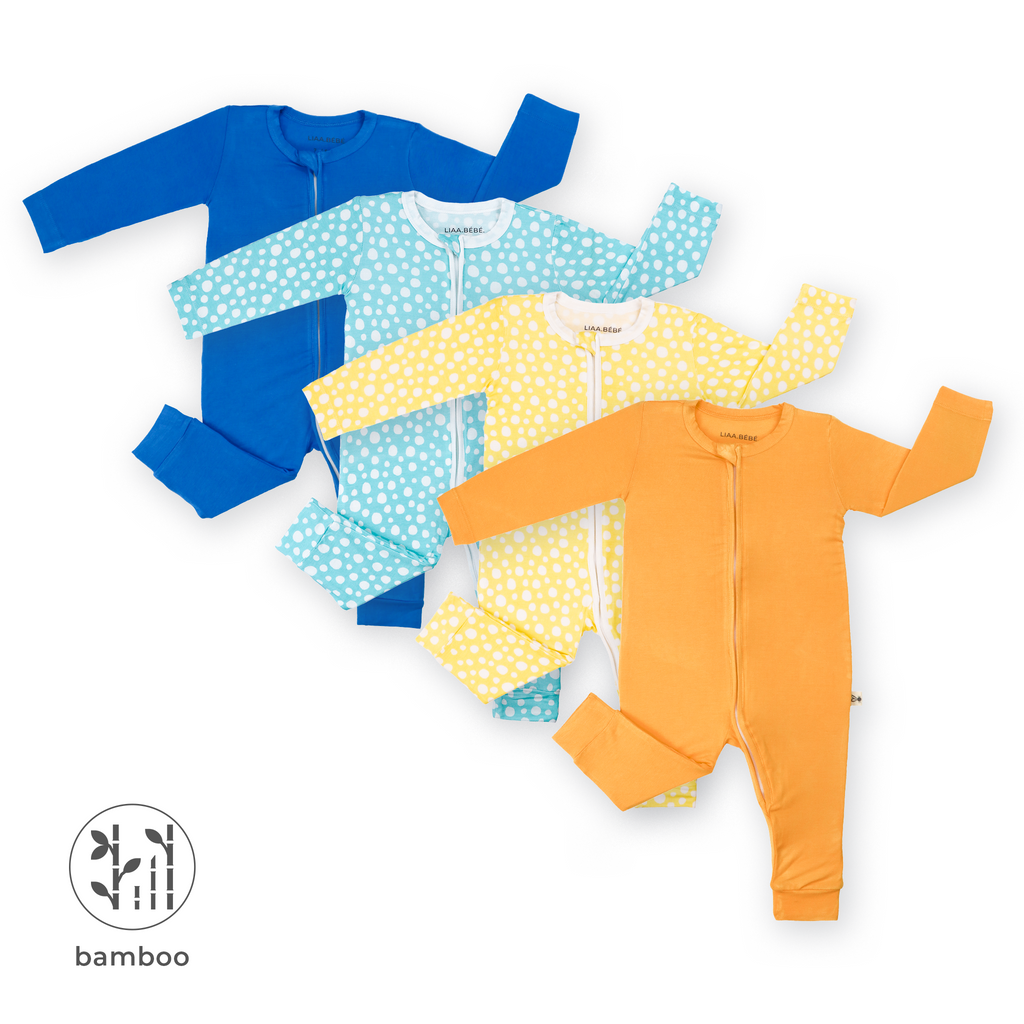 Pack of 4 LiaaBébé Sleepsuits in french blue, marigold orange, light yellow and light blue with dots without feet.